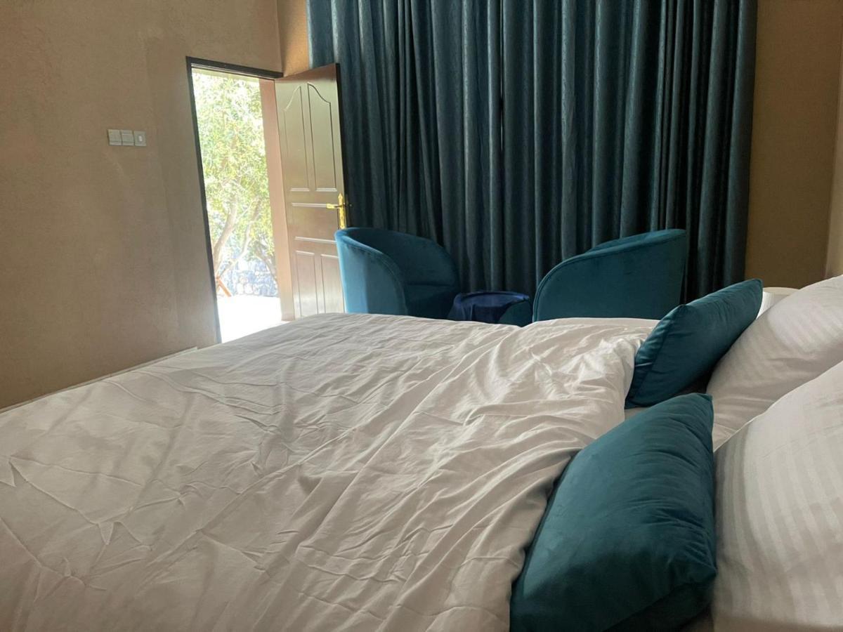 Rose Guesthouse Al 'Aqar Exterior photo